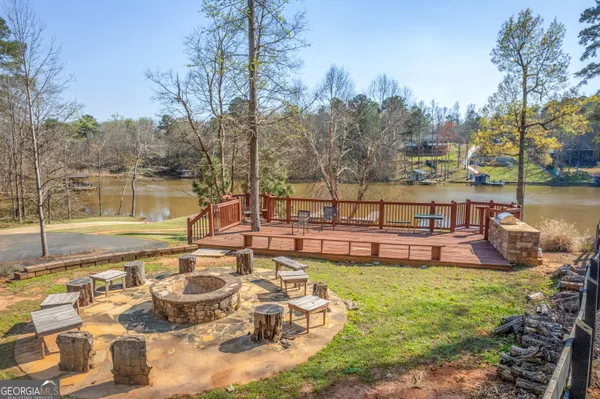 a view of a lake with a patio