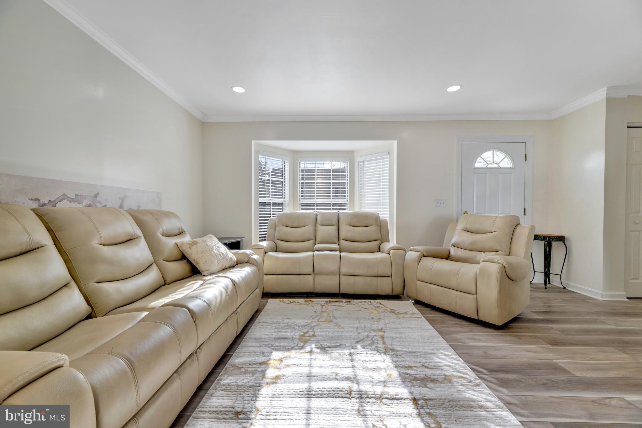7108 Ruthgreen Road Windsor Mill, MD 21244 - Photo 17 of 25 a living room with furniture and a window