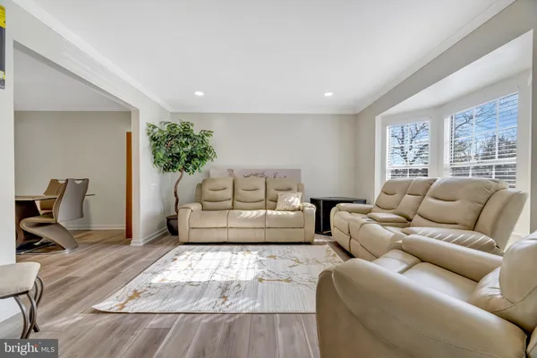a living room with furniture and a couch