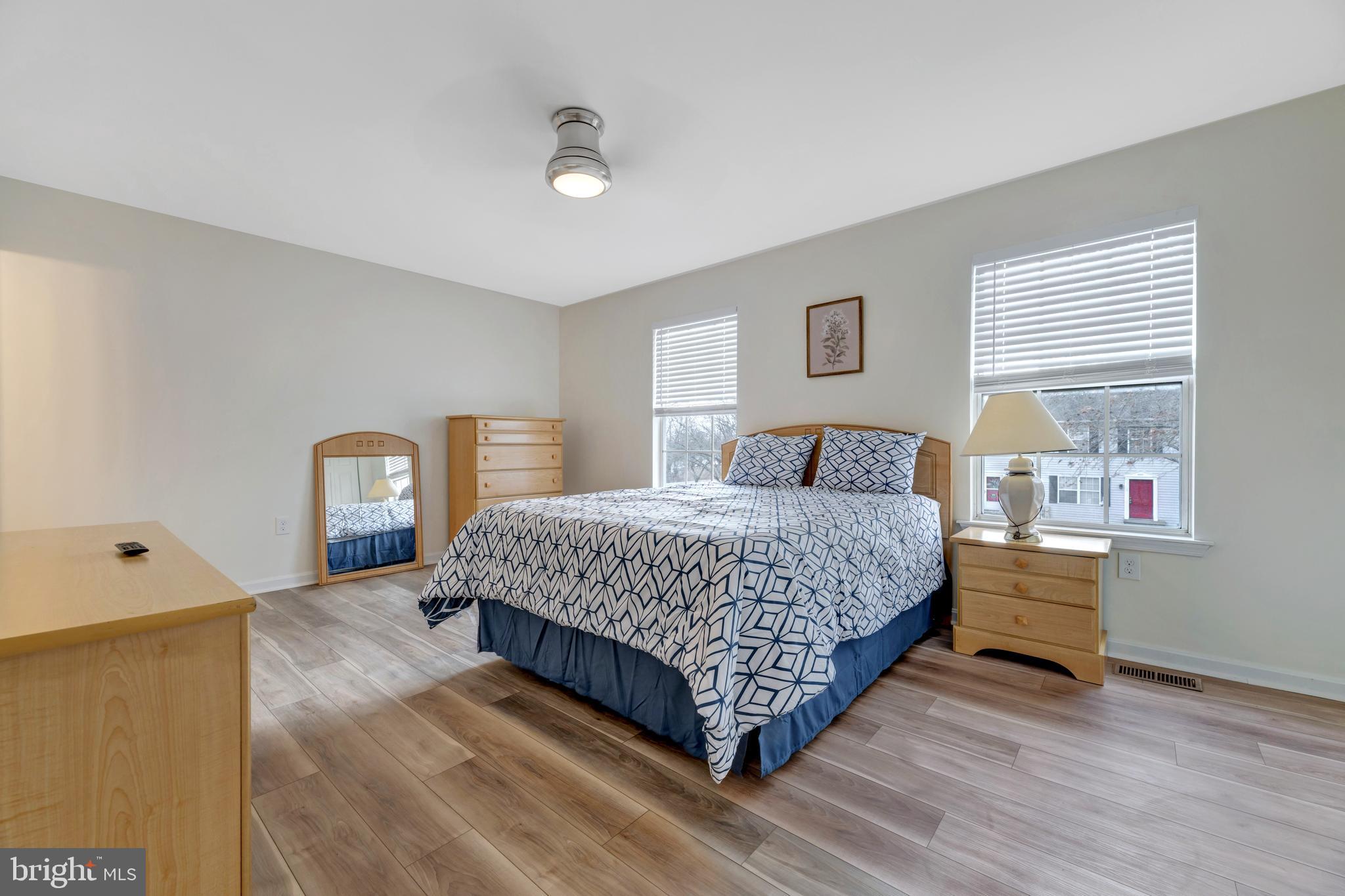 7108 Ruthgreen Road Windsor Mill, MD 21244 - Photo 8 of 25 a bedroom with a bed and a dresser