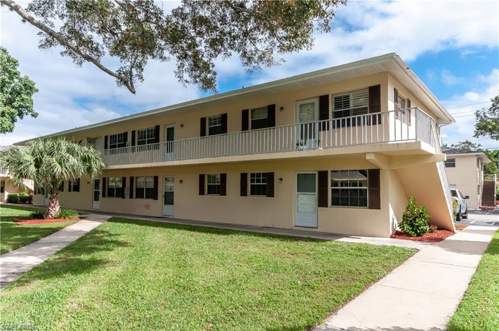 3325 Airport-Pulling Road North, Unit L1 Naples, FL 34105 - Photo 6 of 8 a view of a yard in front of a house