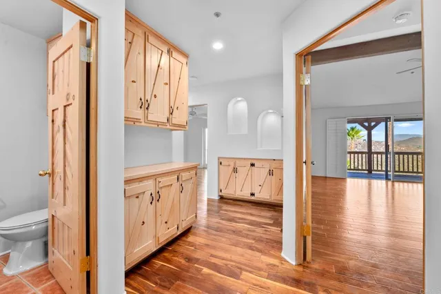 a view of a garden with a building in the background