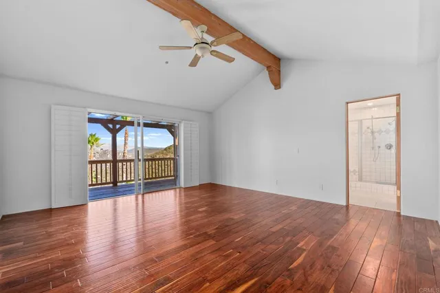 an aerial view of a house with a lake view