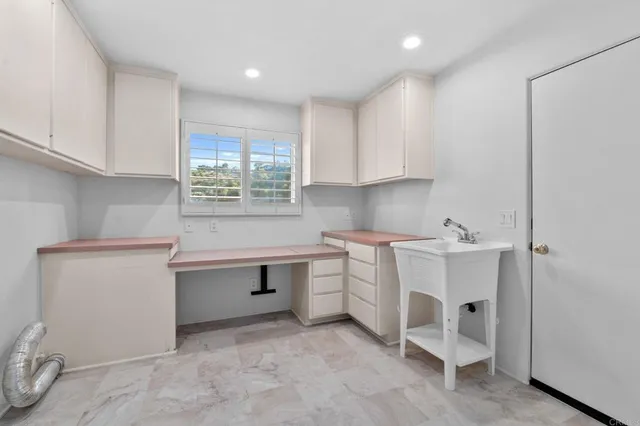 a view of a balcony with wooden floor