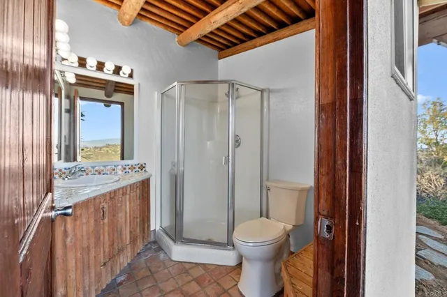 a view of a city with mountains in the background