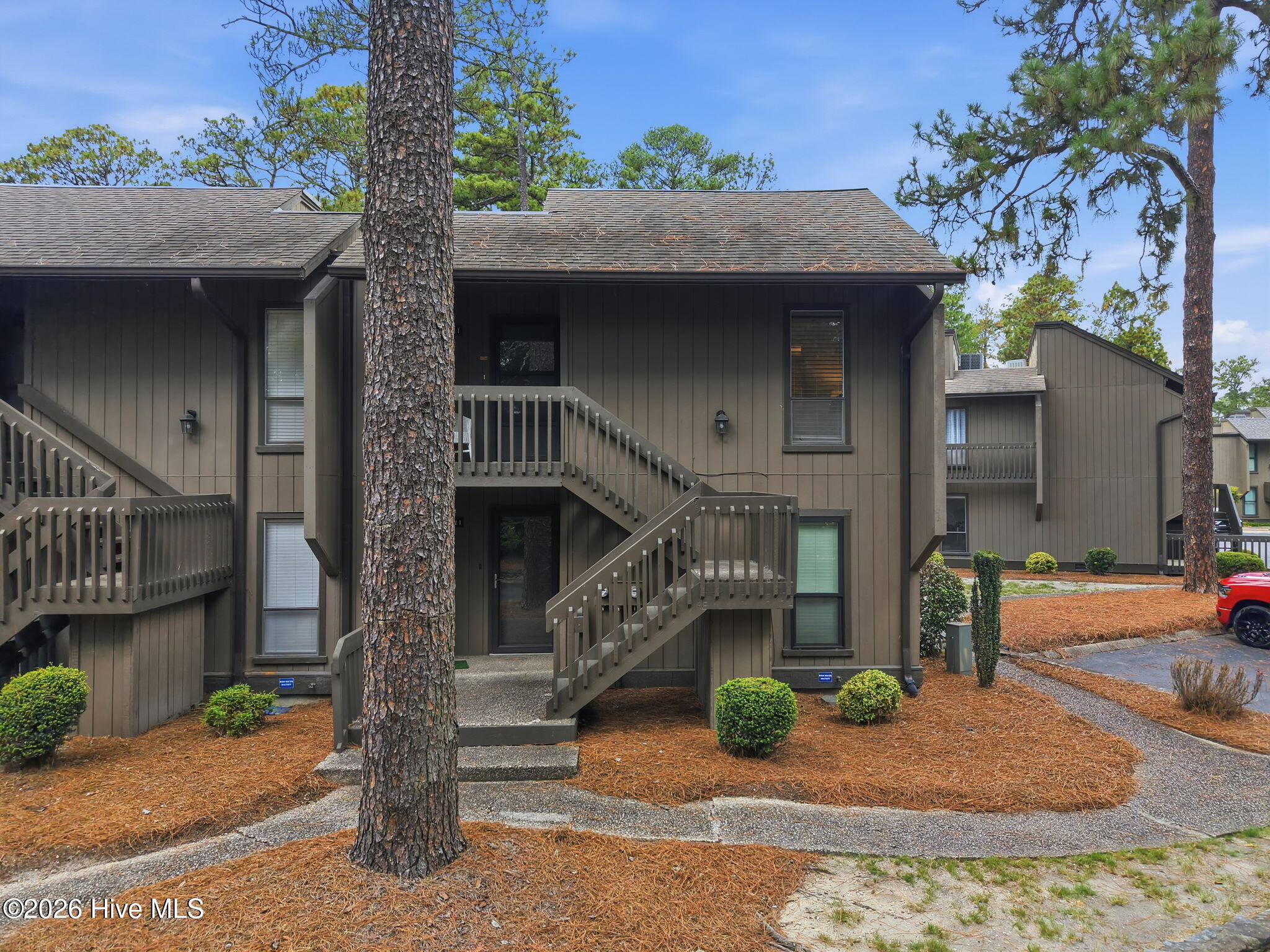 10 Pine Tree Road, Unit 211 Pinehurst, NC 28374 - Photo 1 of 19 1-web-or-mls-DJI_20260707122944_0317_D