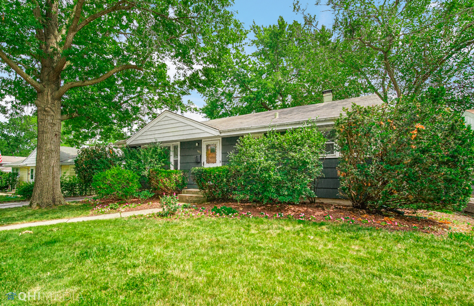 1401 Birch Road Homewood, IL 60430 - Photo 2 of 22 a front view of a house with a yard