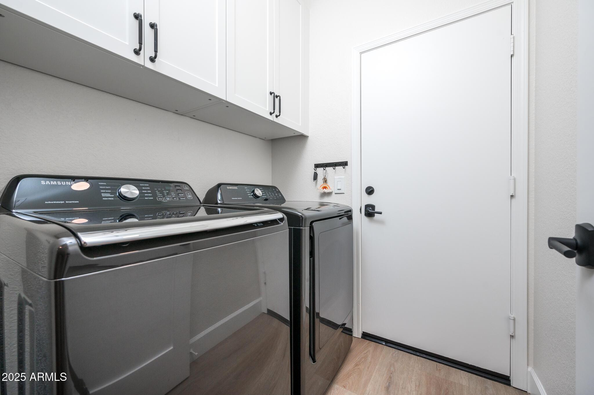 4706 East Jaeger Road Phoenix, AZ 85050 - Photo 25 of 30 a utility room with dryer and washer
