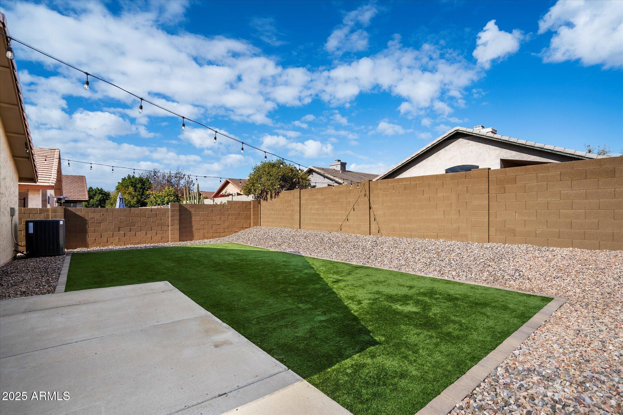 4706 East Jaeger Road Phoenix, AZ 85050 - Photo 27 of 30 a front view of a house with a garden