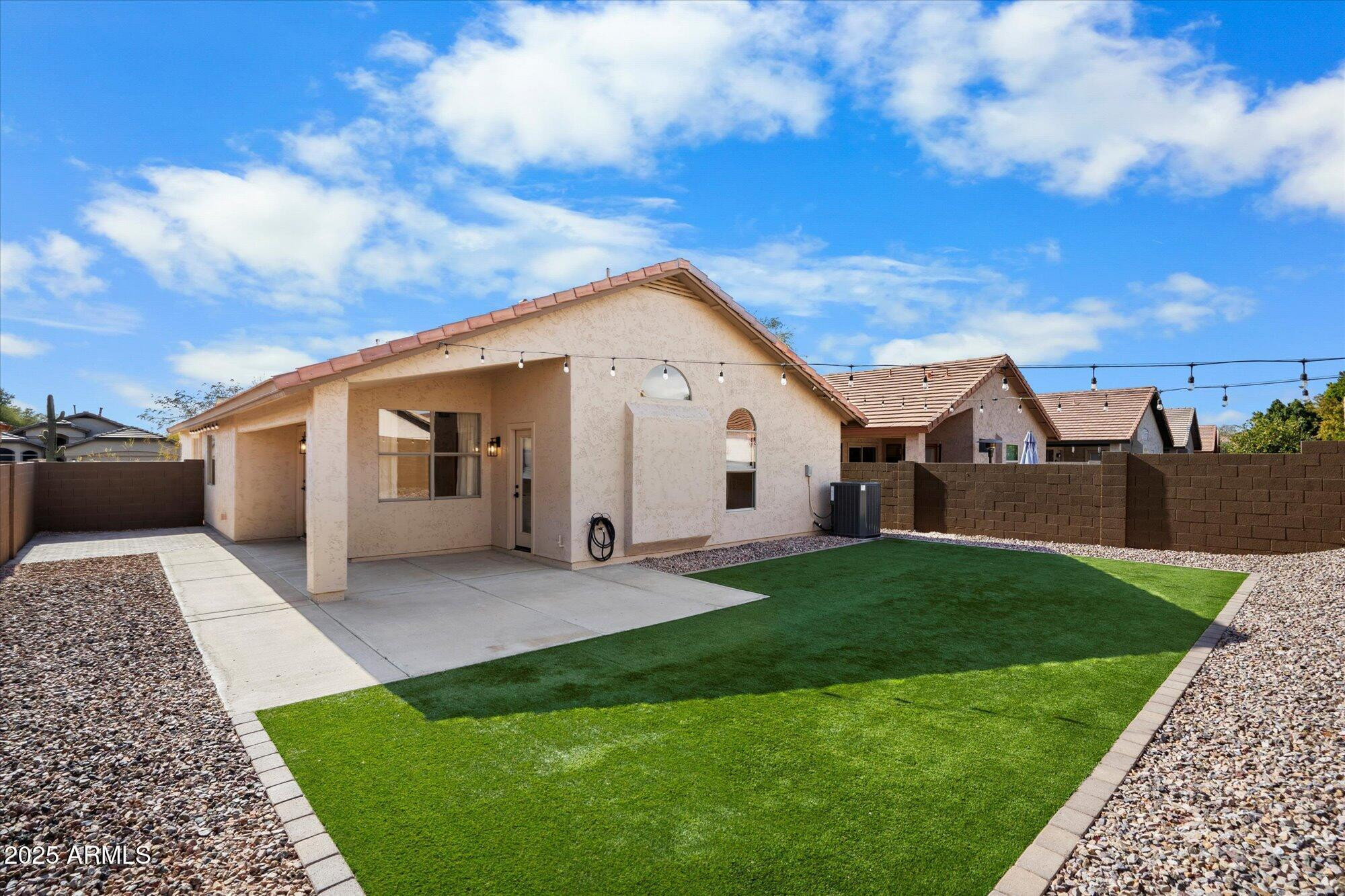 4706 East Jaeger Road Phoenix, AZ 85050 - Photo 28 of 30 a view of house with backyard
