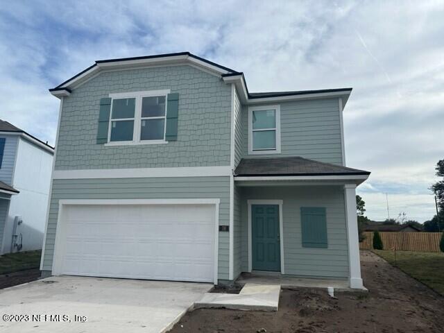 58 Silver Birch St Street St. Augustine, FL 32084 - Photo 1 of 31 a front view of a house