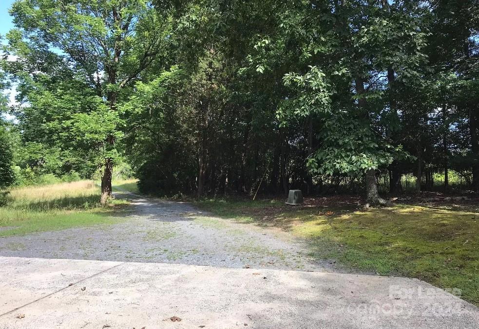 2414 Providence Road South Waxhaw, NC 28173 - Photo 14 of 15 a view of a yard with a tree