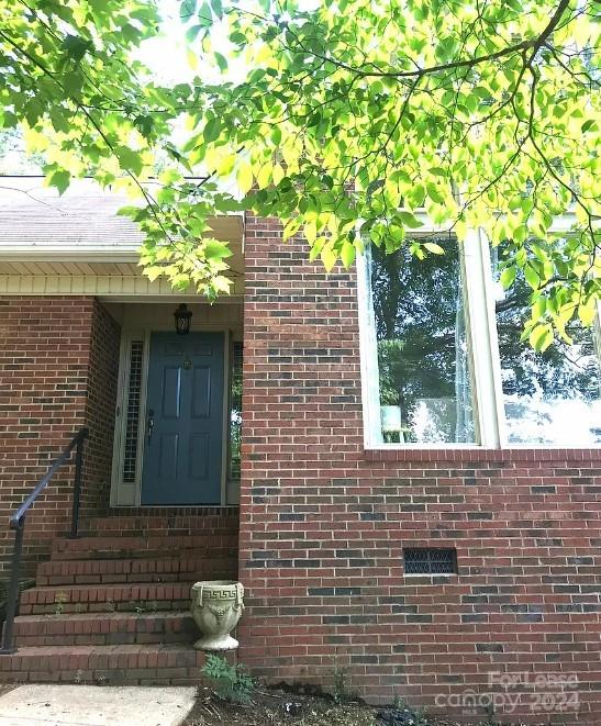 2414 Providence Road South Waxhaw, NC 28173 - Photo 2 of 15 a front view of a house with a tree