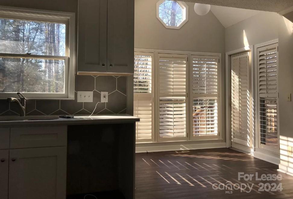 2414 Providence Road South Waxhaw, NC 28173 - Photo 5 of 15 a kitchen with granite countertop a sink and a window