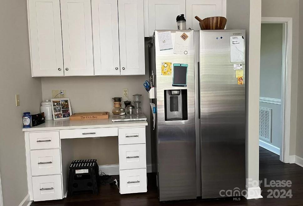 2414 Providence Road South Waxhaw, NC 28173 - Photo 7 of 15 a kitchen with a refrigerator and cabinets