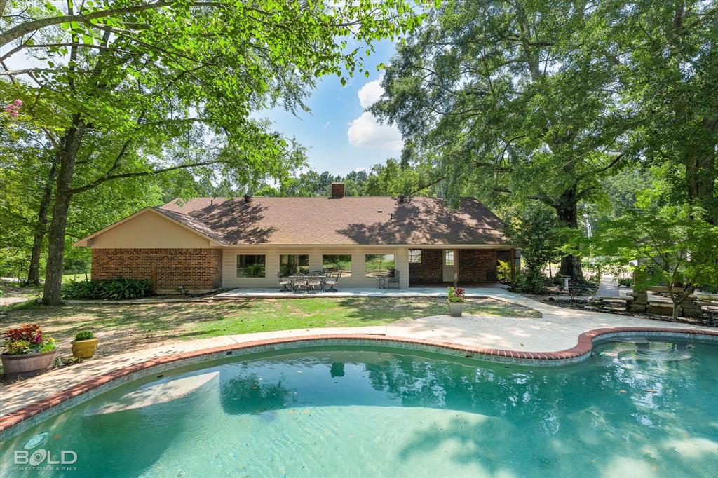 5800 Jefferson Paige Road Shreveport, LA 71119 - Photo 4 of 39 a view of a house with swimming pool