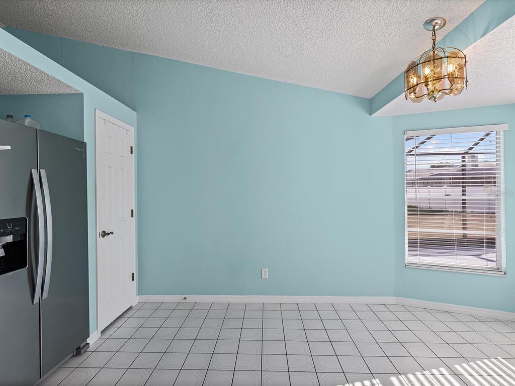 5853 Redhawk Drive New Port Richey, FL 34655 - Photo 14 of 38 a view of an empty room and window