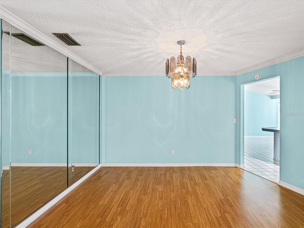 5853 Redhawk Drive New Port Richey, FL 34655 - Photo 20 of 38 a very nice looking room with wooden floor