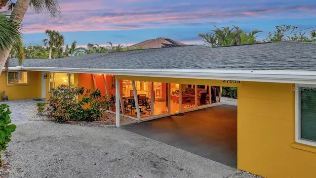 a view of a swimming pool with a lounge chair