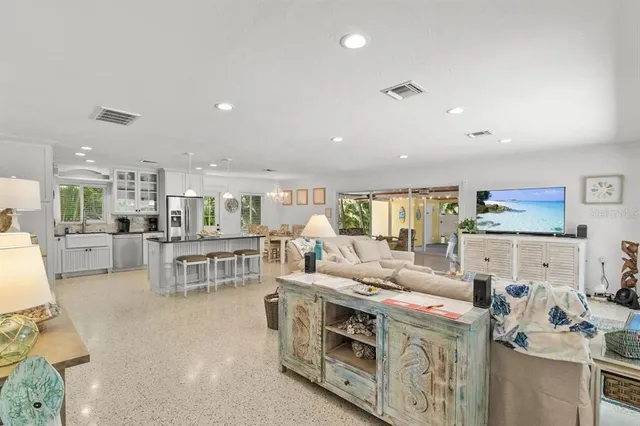 a living room with furniture and a table