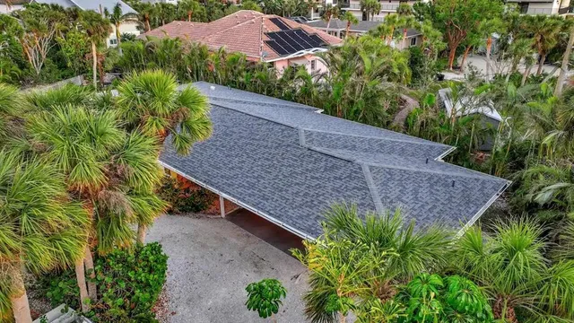 a view of a backyard with plants