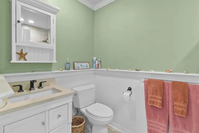 a bathroom with a sink and a toilet