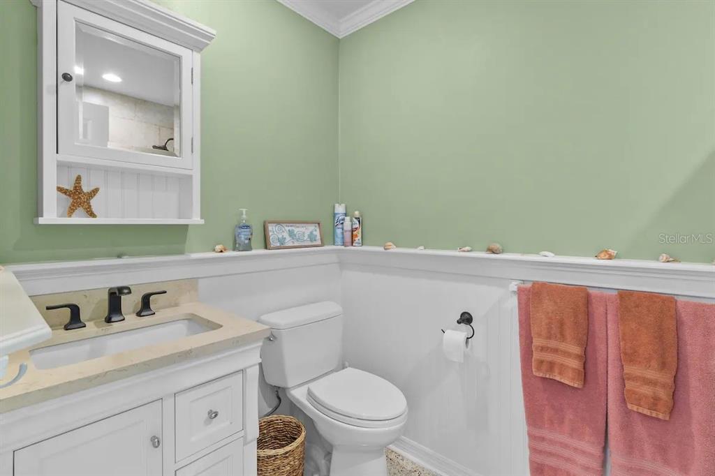 2795 North Beach Road, Unit A Englewood, FL 34223 - Photo 32 of 53 a bathroom with a sink and a toilet