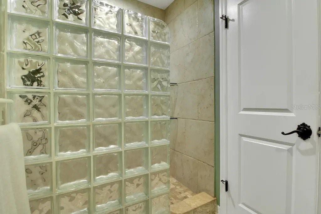 2795 North Beach Road, Unit A Englewood, FL 34223 - Photo 34 of 53 a bathroom with a shower