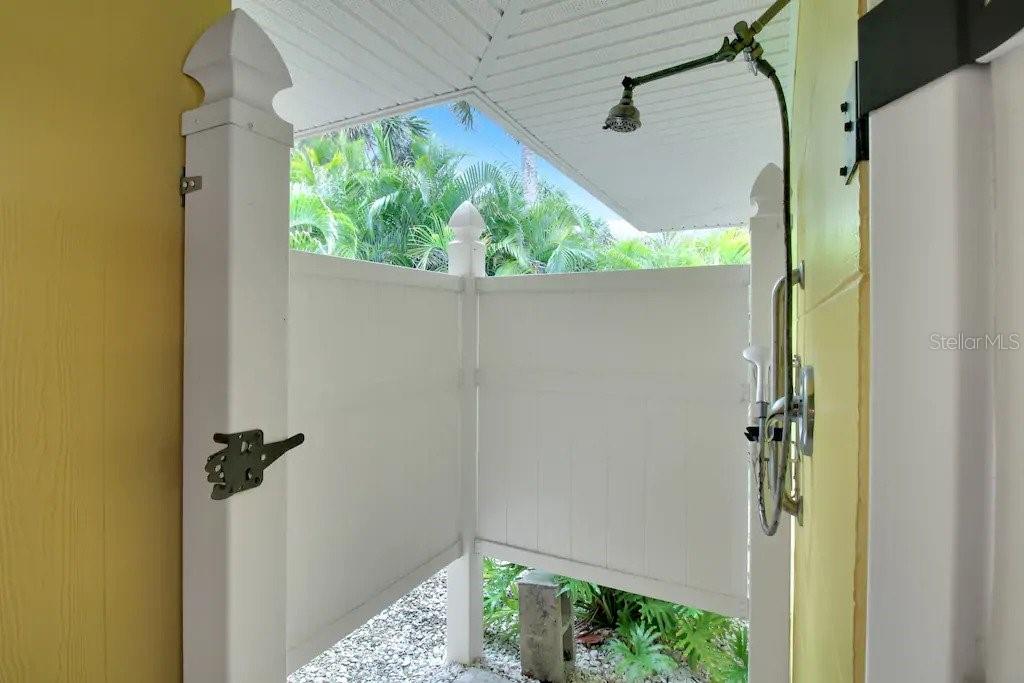 2795 North Beach Road, Unit A Englewood, FL 34223 - Photo 41 of 53 a bathroom with a shower