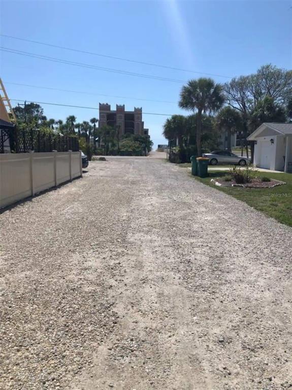 2795 North Beach Road, Unit A Englewood, FL 34223 - Photo 47 of 53 a view of backyard with residential houses