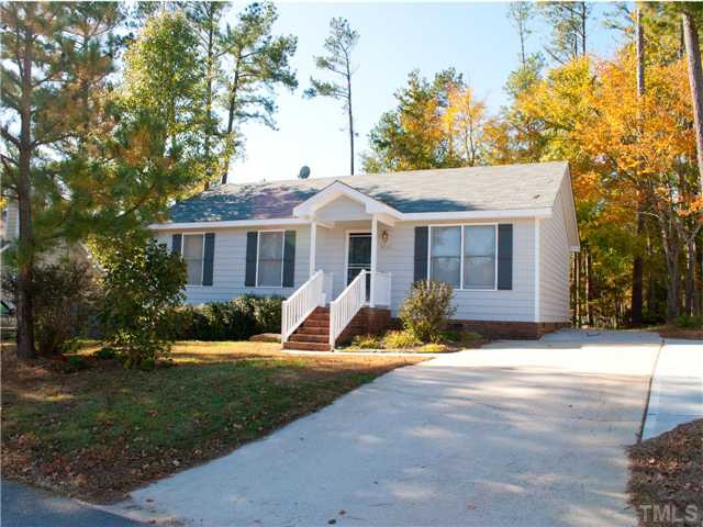3629 Castlegate Drive Raleigh, NC 27616 - Photo 1 of 9 a view of a house with backyard sitting area and garden