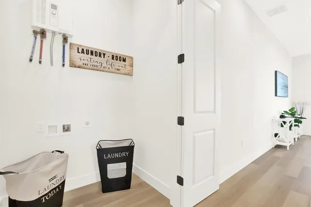 a view of an entryway with hallway