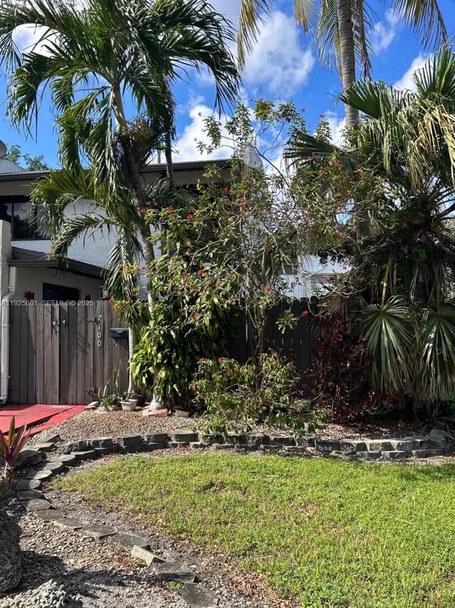 7100 Southwest 112th Place Miami, FL 33173 - Photo 2 of 21 a view of a backyard