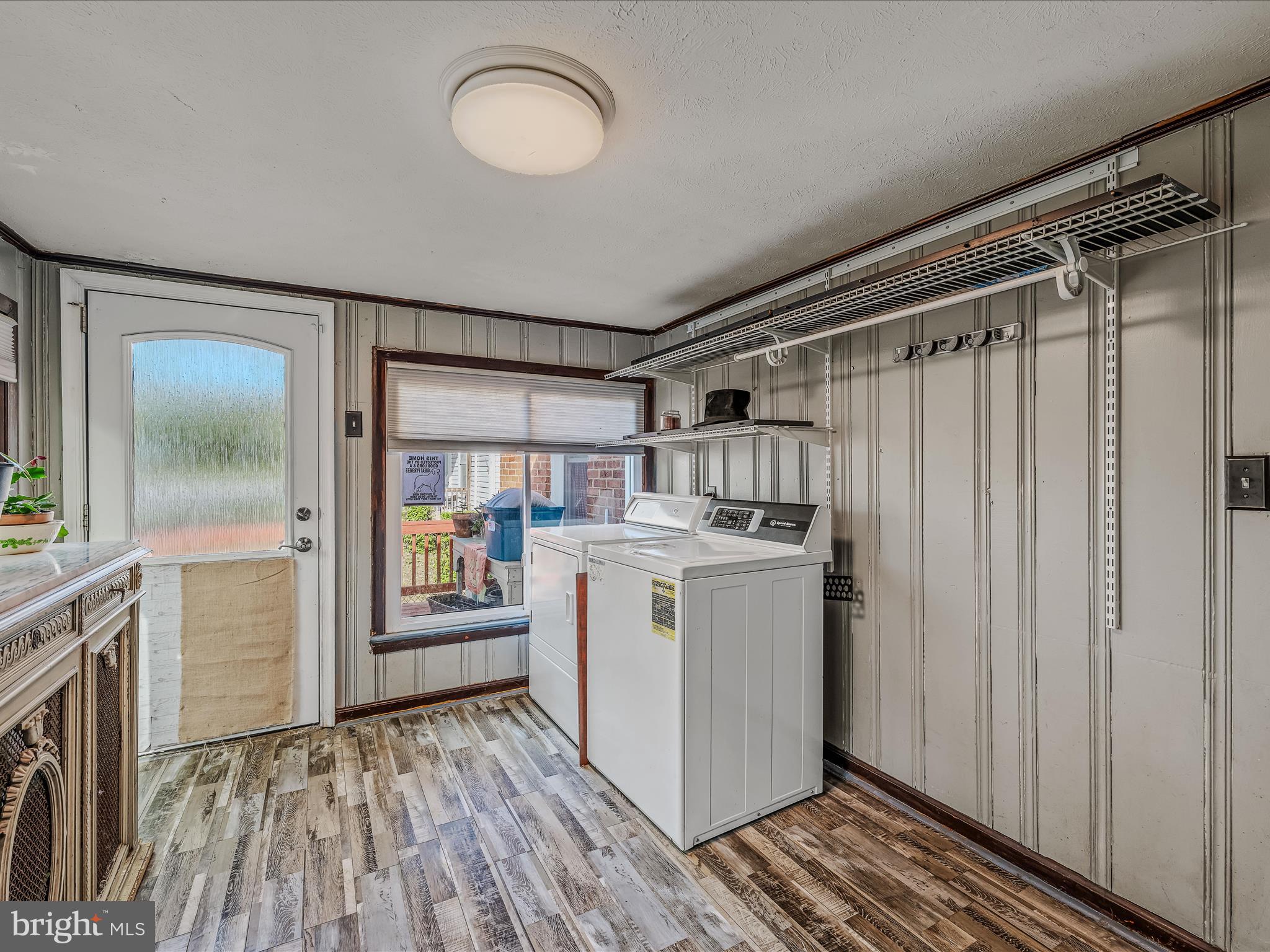 9872 Winchester Avenue Bunker Hill, WV 25413 - Photo 16 of 46 a view of a storage and utility room with washer and dryer