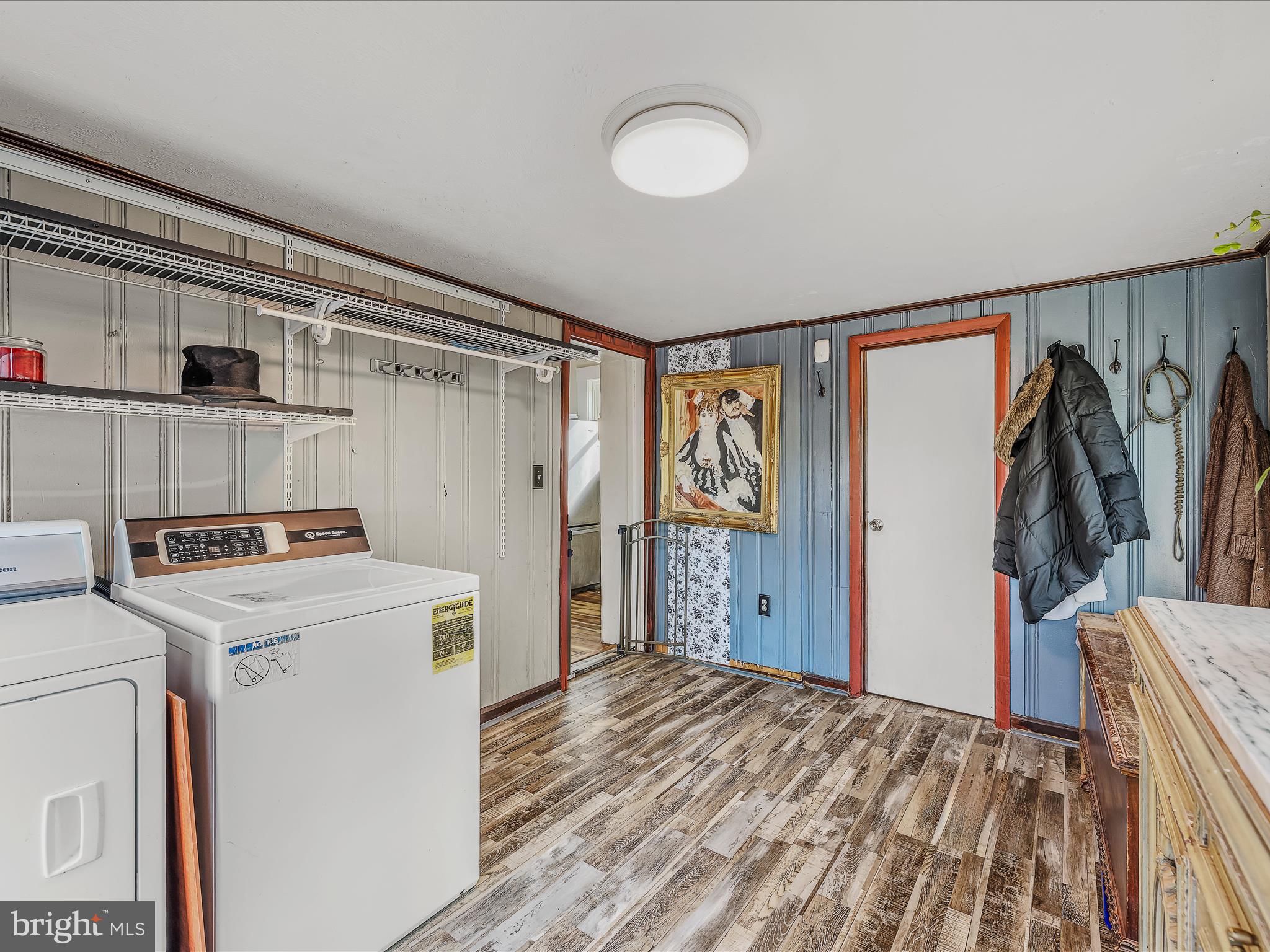 9872 Winchester Avenue Bunker Hill, WV 25413 - Photo 17 of 46 a view of walk in closet with clothes and shoes