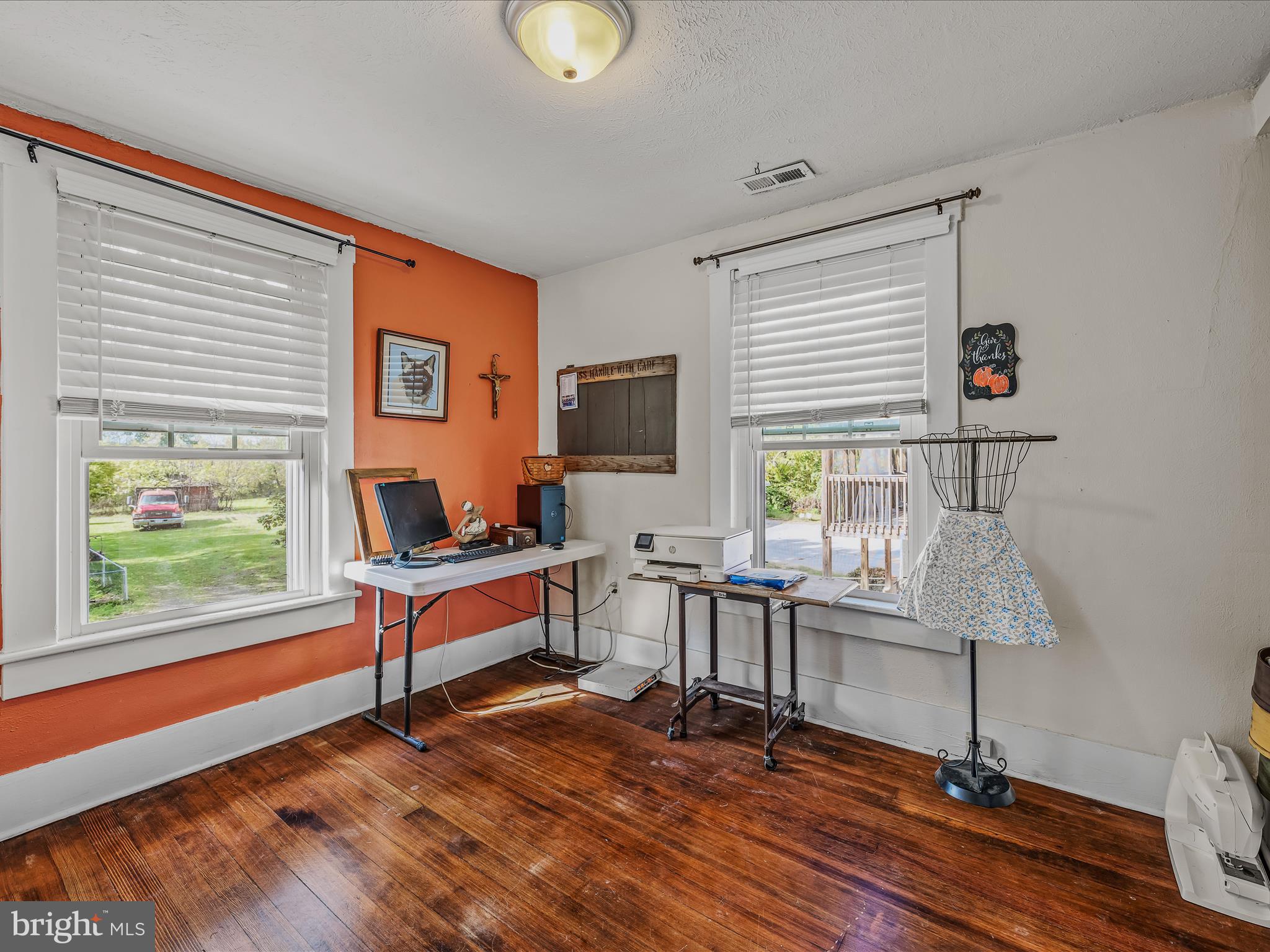 9872 Winchester Avenue Bunker Hill, WV 25413 - Photo 26 of 46 a living room with furniture and a window