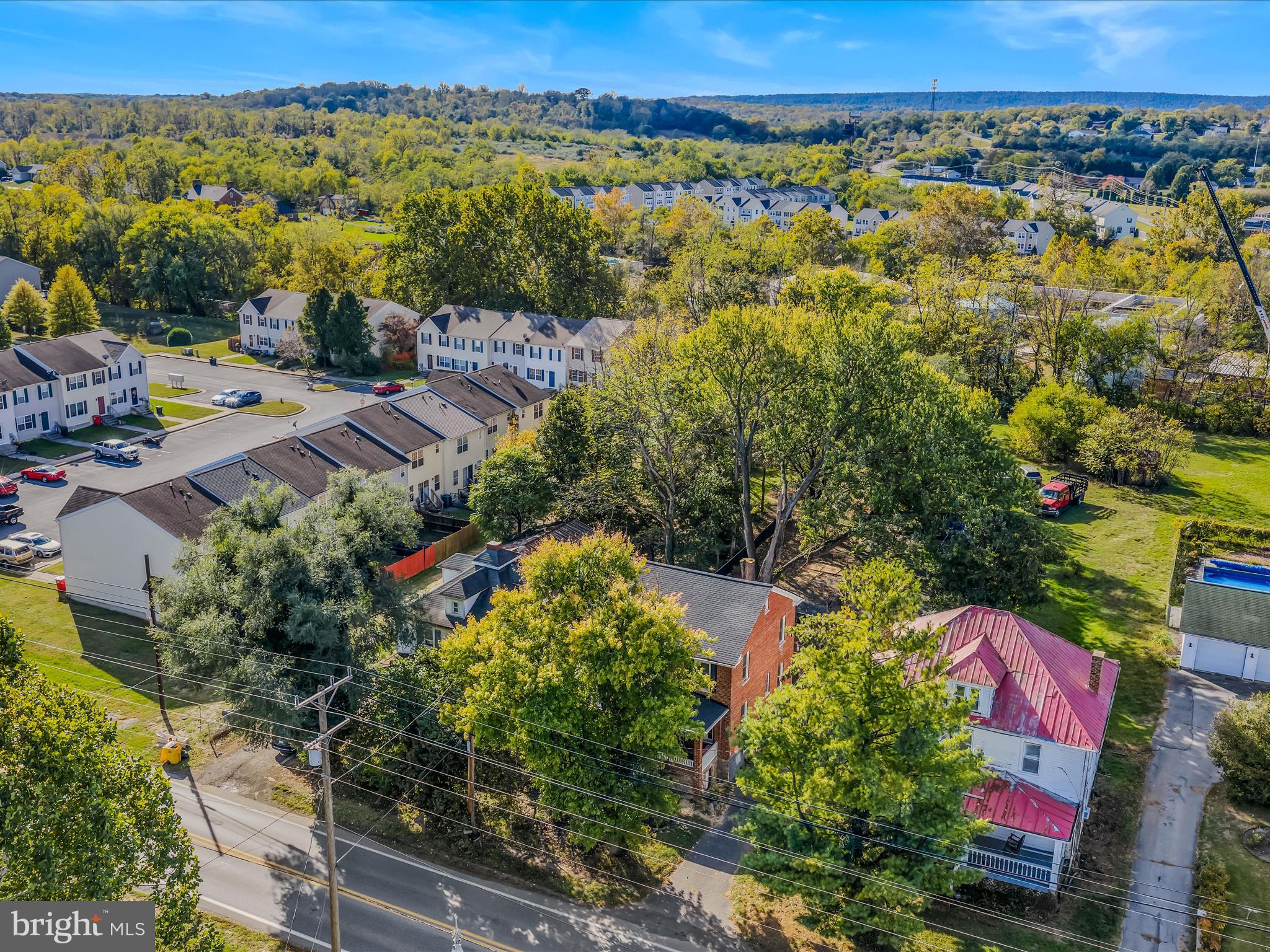 9872 Winchester Avenue Bunker Hill, WV 25413 - Photo 40 of 46 an aerial view of multiple house