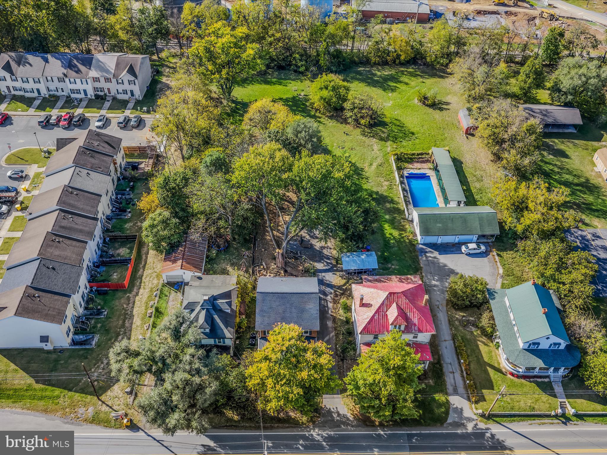 9872 Winchester Avenue Bunker Hill, WV 25413 - Photo 43 of 46 an aerial view of residential houses with outdoor space