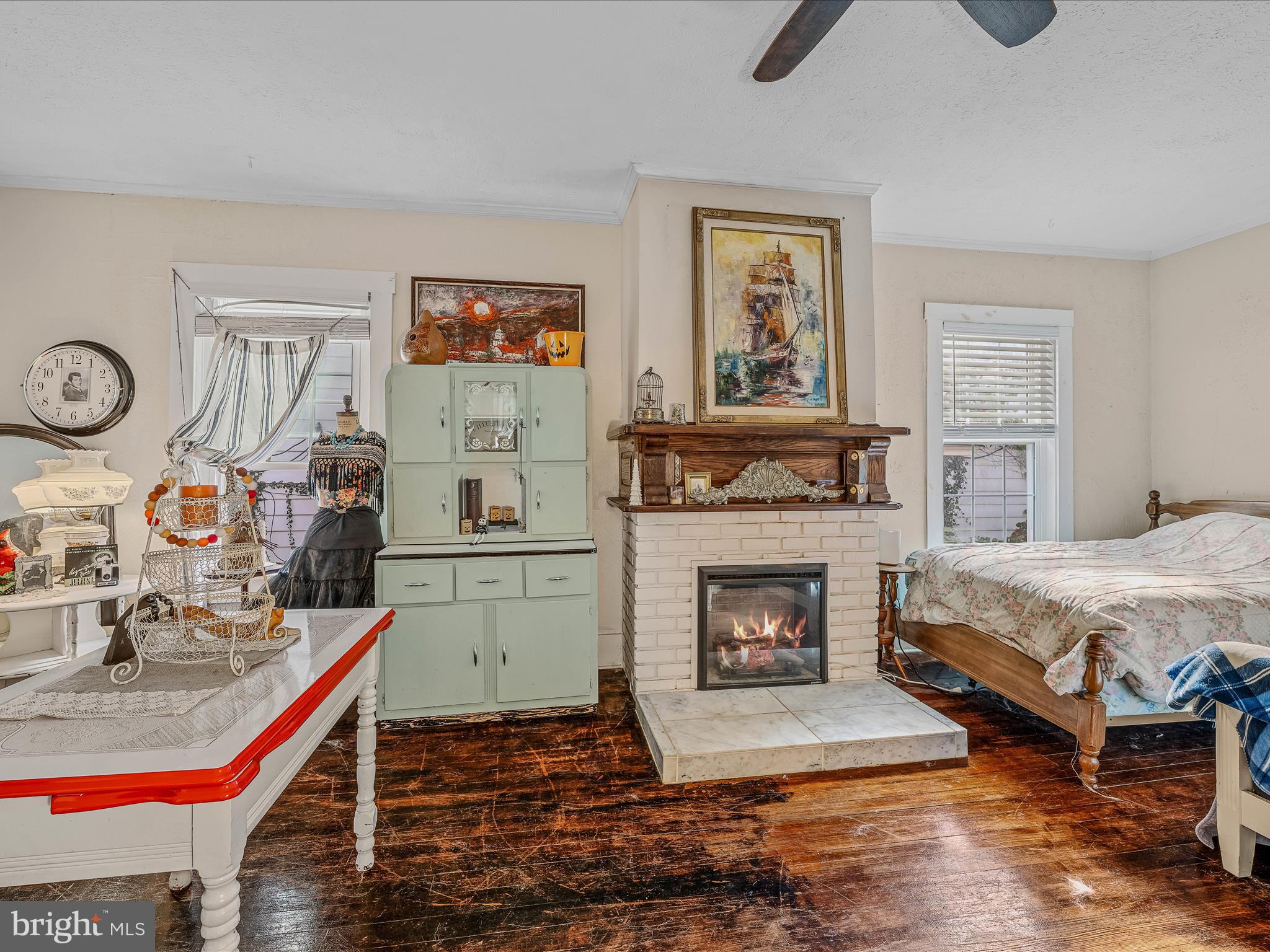 9872 Winchester Avenue Bunker Hill, WV 25413 - Photo 7 of 46 a living room with furniture and a fireplace