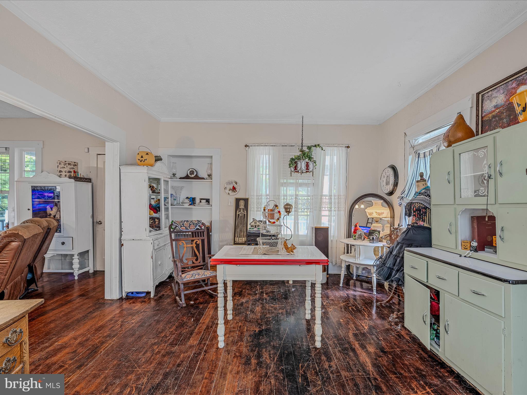 9872 Winchester Avenue Bunker Hill, WV 25413 - Photo 9 of 46 a dining room with furniture and wooden floor