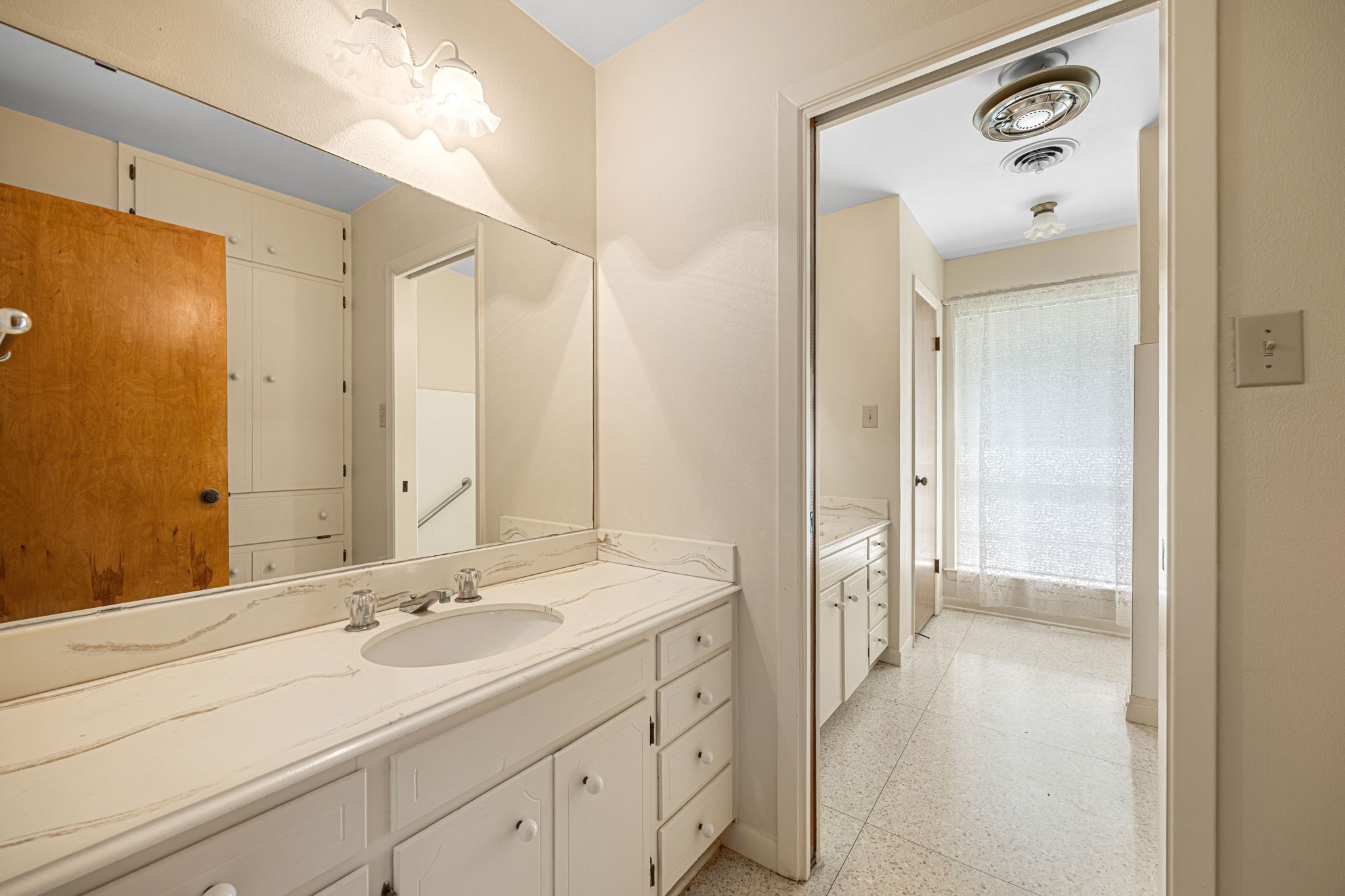 613 Baker Road Rosenberg, TX 77471 - Photo 17 of 28 a bathroom with a double vanity sink mirror and shower