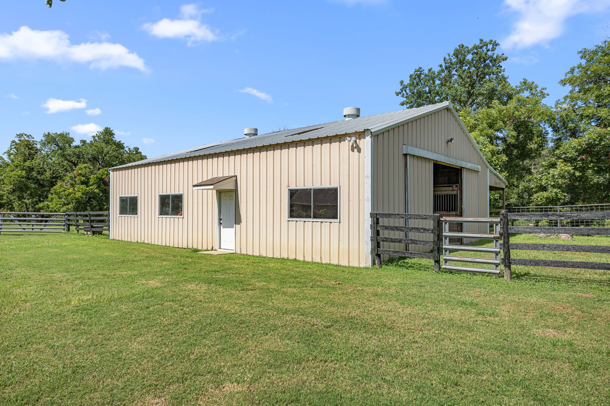 613 Baker Road Rosenberg, TX 77471 - Photo 23 of 28 a view of a house with a backyard