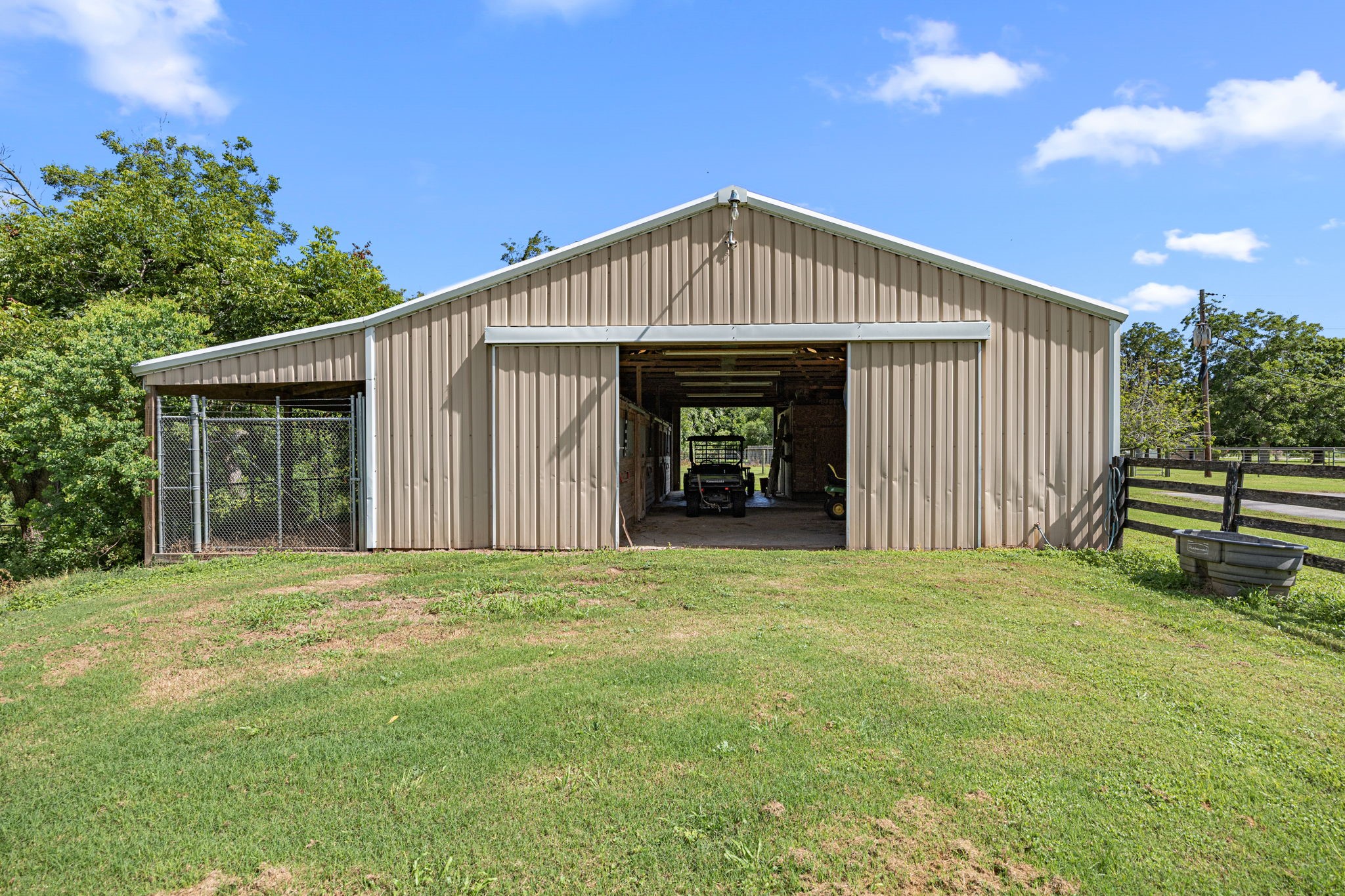 613 Baker Road Rosenberg, TX 77471 - Photo 24 of 28 a view of a house with a yard