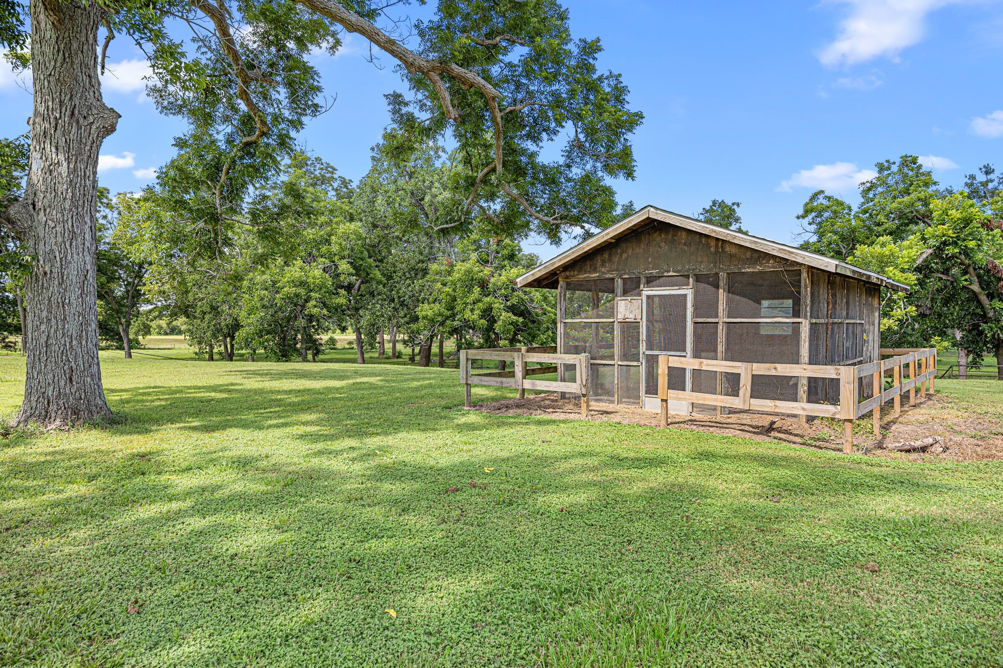 613 Baker Road Rosenberg, TX 77471 - Photo 25 of 28 a view of a house with a yard