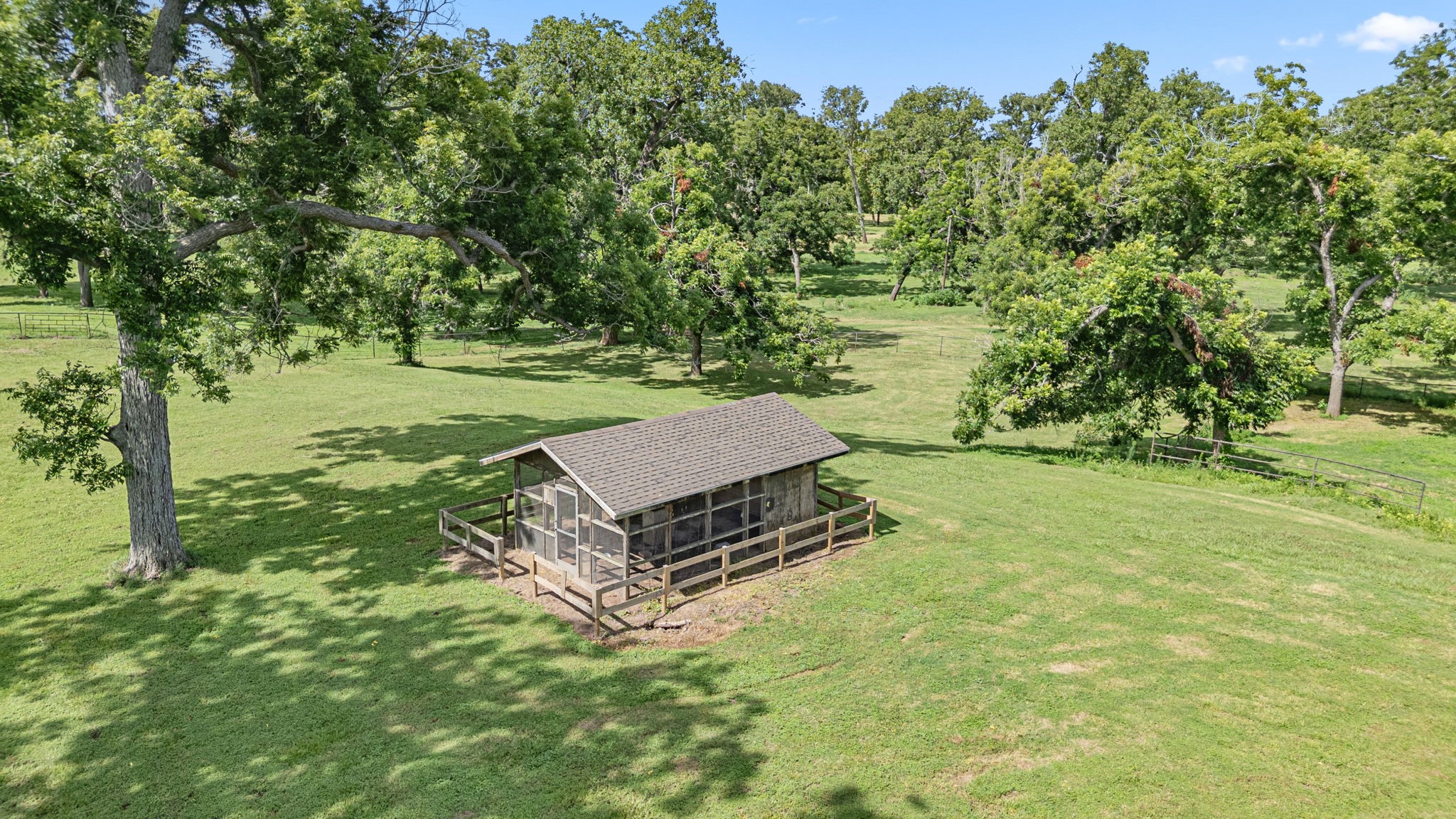613 Baker Road Rosenberg, TX 77471 - Photo 26 of 28 a view of a backyard with a garden