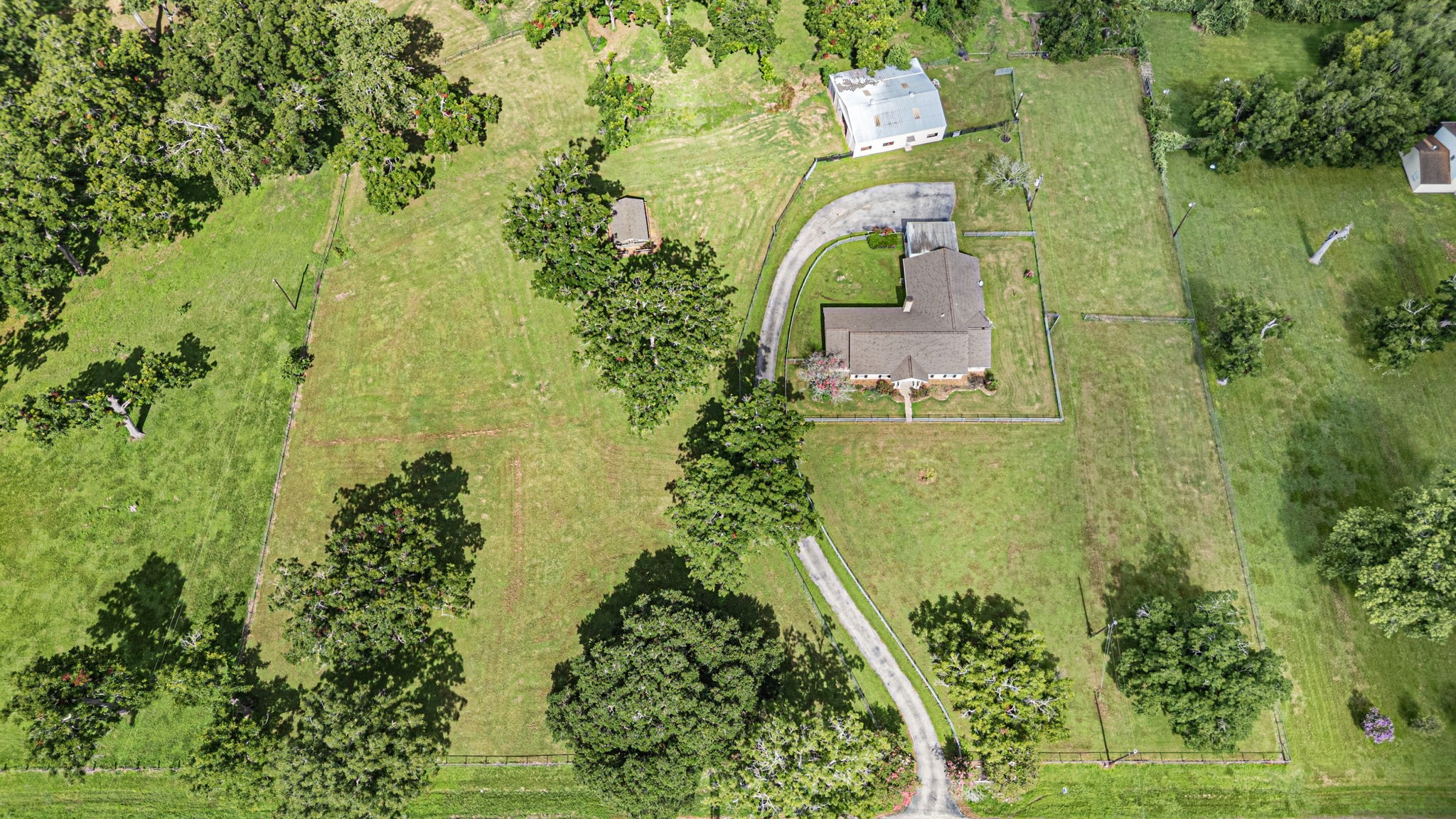 613 Baker Road Rosenberg, TX 77471 - Photo 28 of 28 an aerial view of a house with a garden