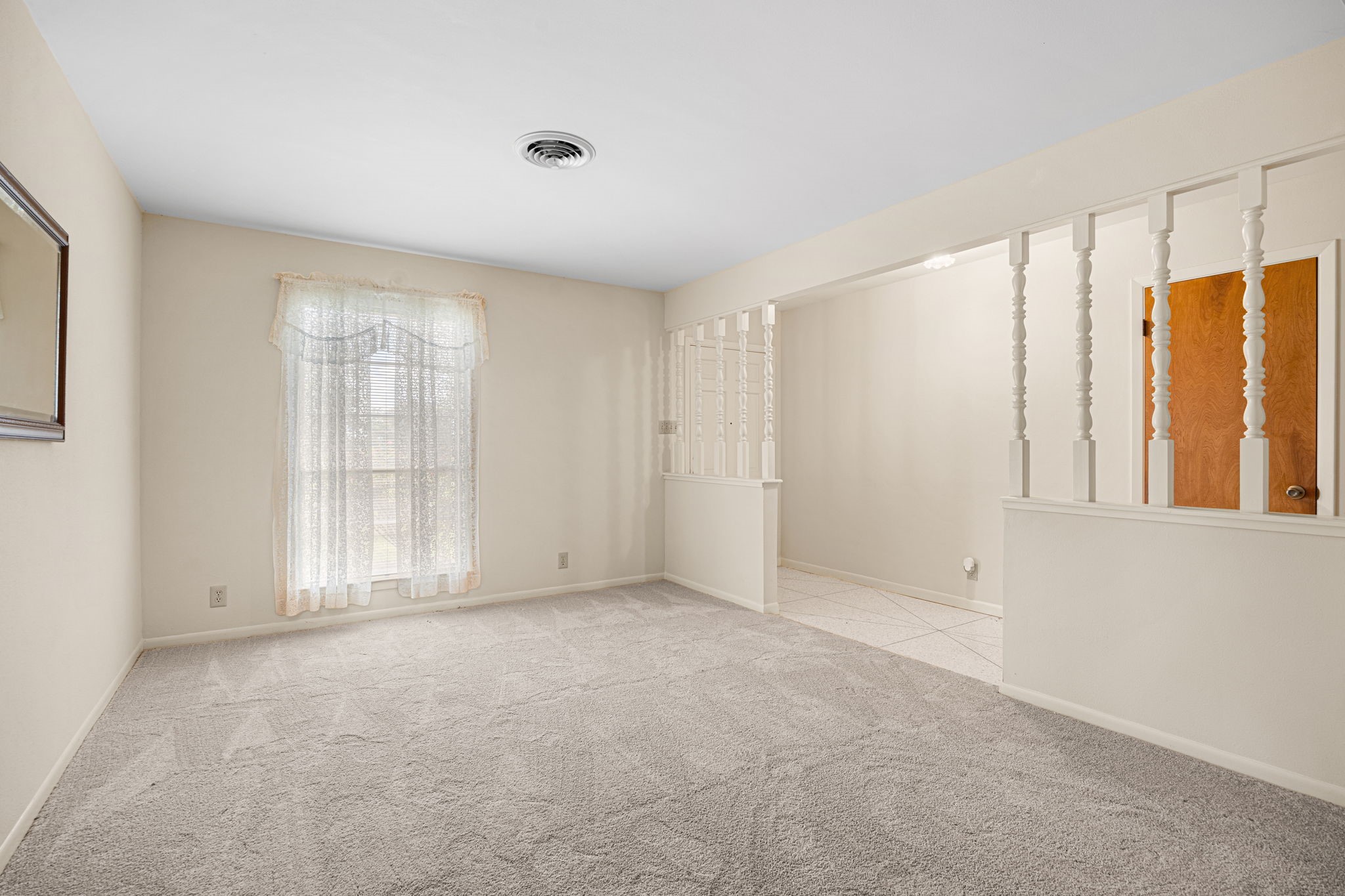 613 Baker Road Rosenberg, TX 77471 - Photo 8 of 28 a view of an empty room with a window