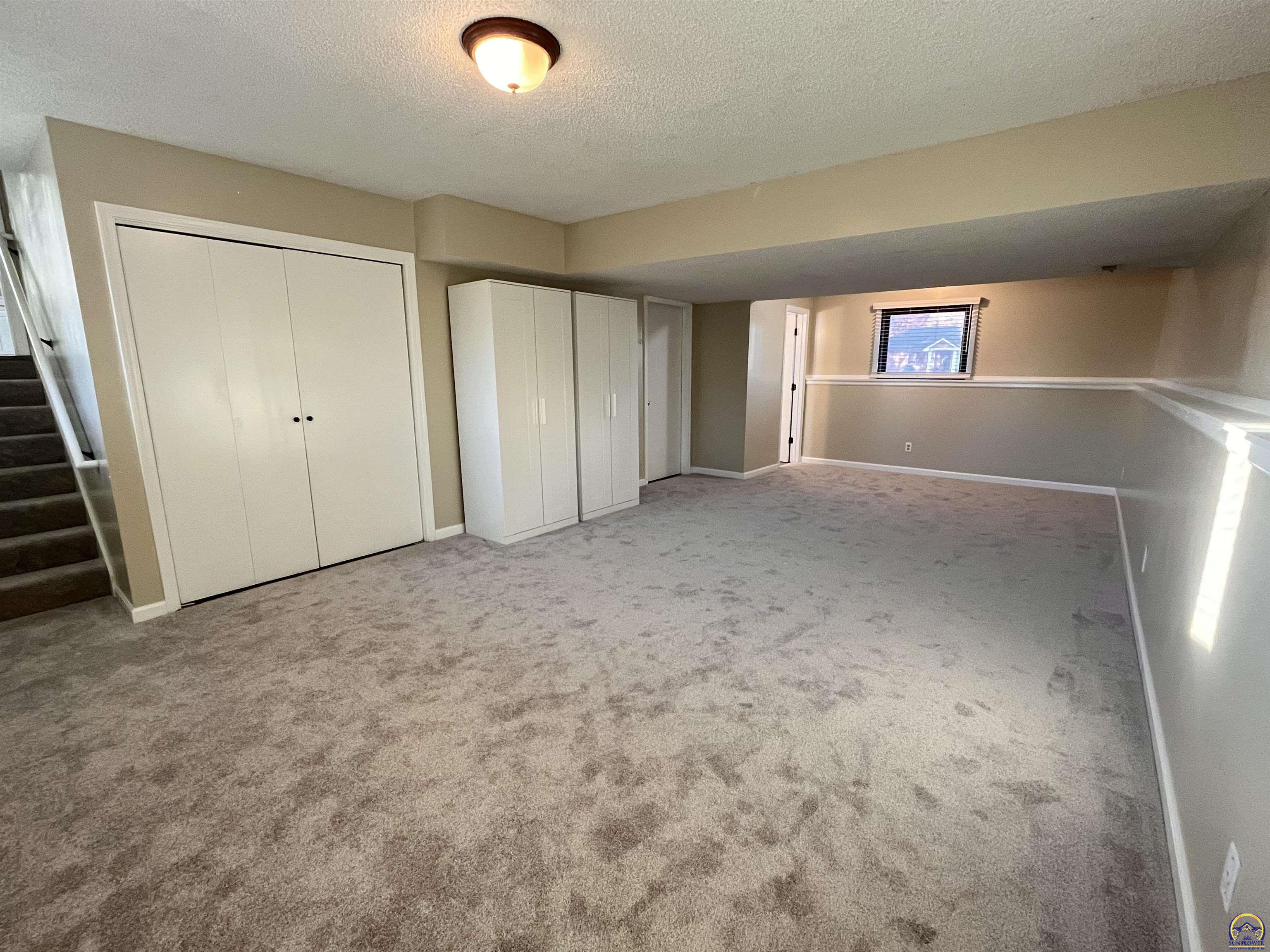 8001 Southwest 24th Street Topeka, KS 66614 - Photo 20 of 32 Lower Level 4th Bedroom/Rec Room