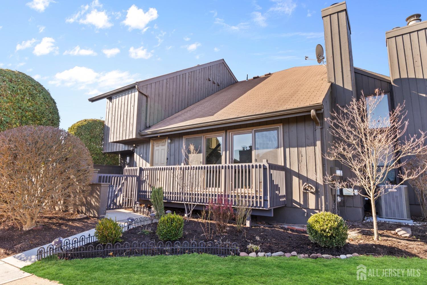 171 Westgate Drive Edison, NJ 08820 - Photo 1 of 49 a view of a house with a yard