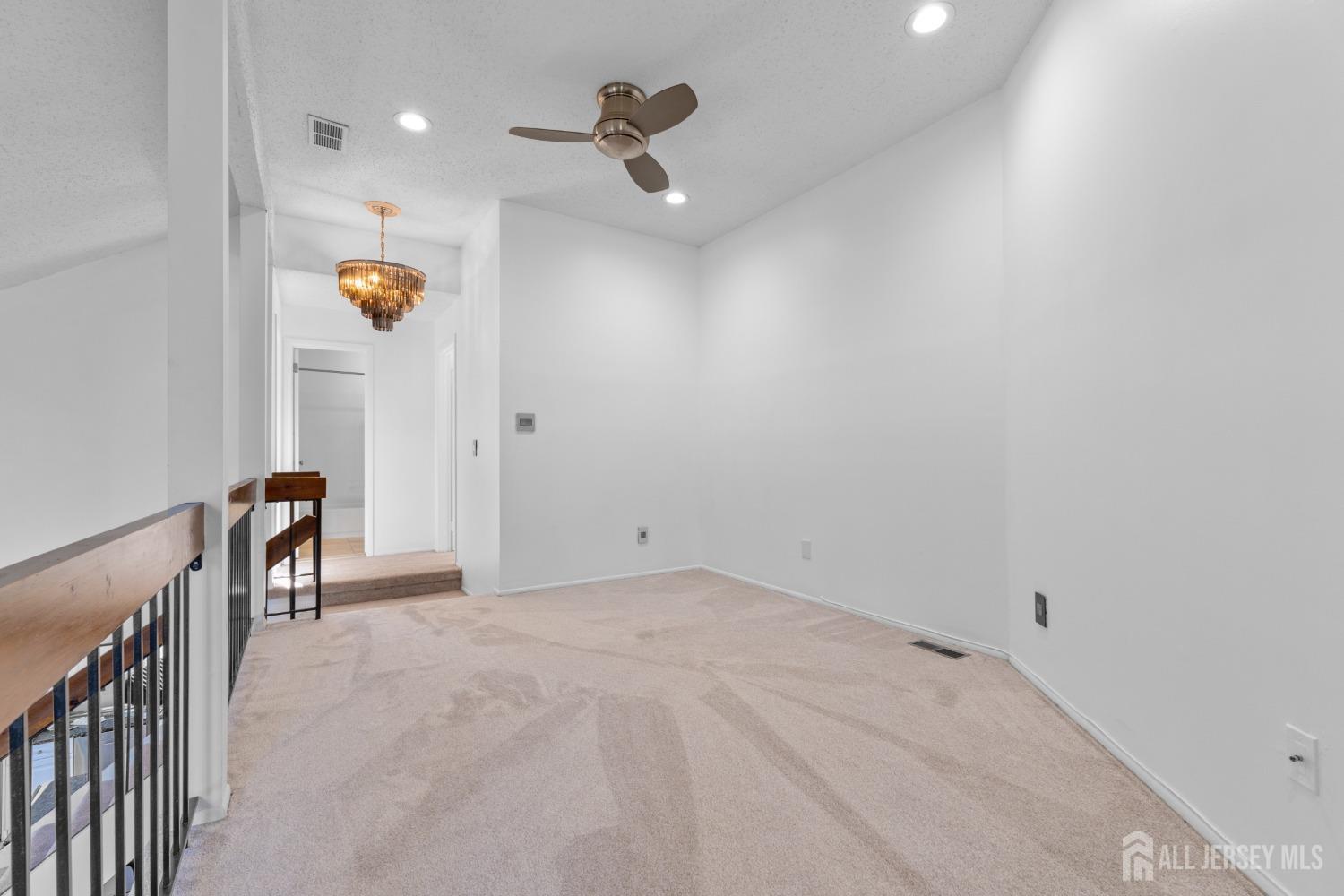 171 Westgate Drive Edison, NJ 08820 - Photo 26 of 49 a view of an empty room and window